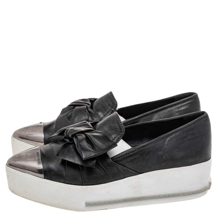 Pre Owned Miu Miu Black Leather Knot Bow Skate Metal Cap Toe Slip On Sneakers Size 38