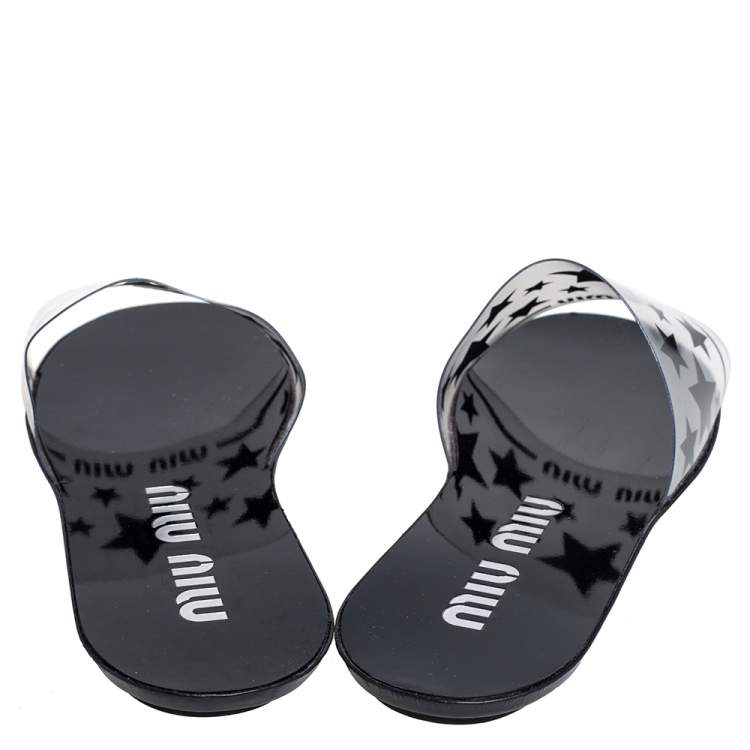 مملوكة مسبقًا Miu Miu Black/Transparent Star Print PVC Flat Slide Sandals Size 36.5