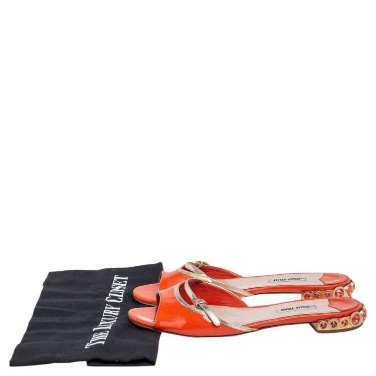 مملوكة مسبقًا Miu Miu Orange Patent Leather  Slide Sandals Size 36.5