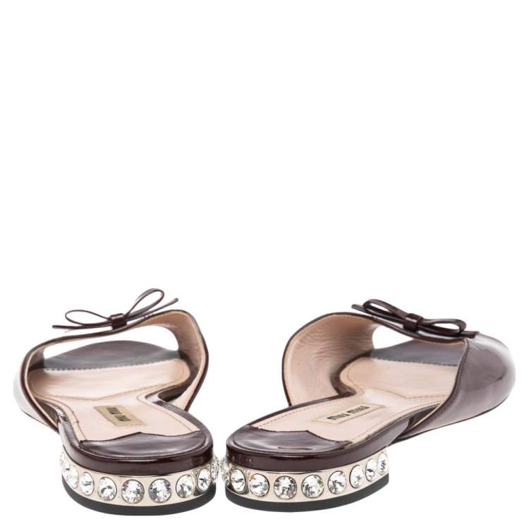 Pre Owned Miu Miu Burgundy Patent Leather Crystal Embellished Bow Slide Flats Size 37.5