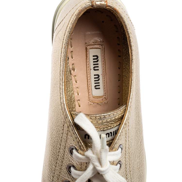 Pre Owned Miu Miu Metallic Gold Leather Crystal Embellished Metal Cap Toe Low Top Sneakers Size 36