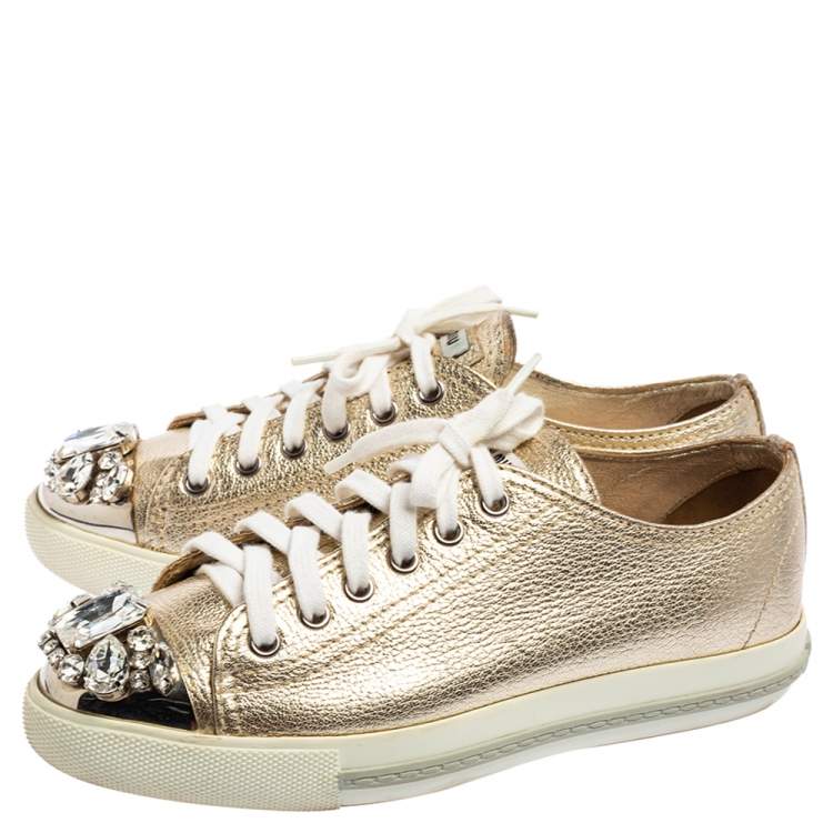 Pre Owned Miu Miu Metallic Gold Leather Crystal Embellished Metal Cap Toe Low Top Sneakers Size 36