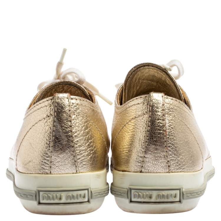 Pre Owned Miu Miu Metallic Gold Leather Crystal Embellished Metal Cap Toe Low Top Sneakers Size 36