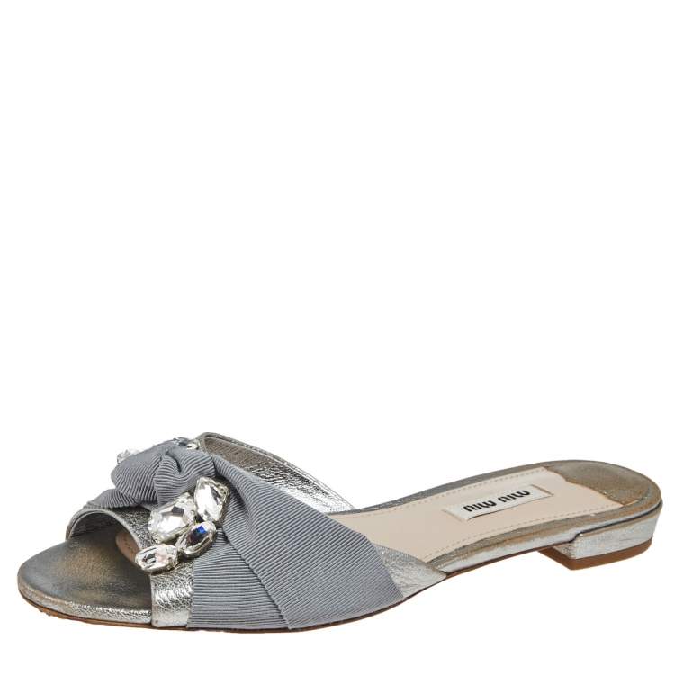 Pre Owned Miu Miu Silver Leather  Knot Crystal Embellished Slide Sandals Size 38