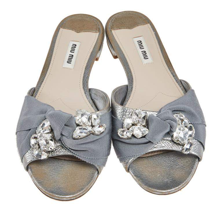 Pre Owned Miu Miu Silver Leather  Knot Crystal Embellished Slide Sandals Size 38