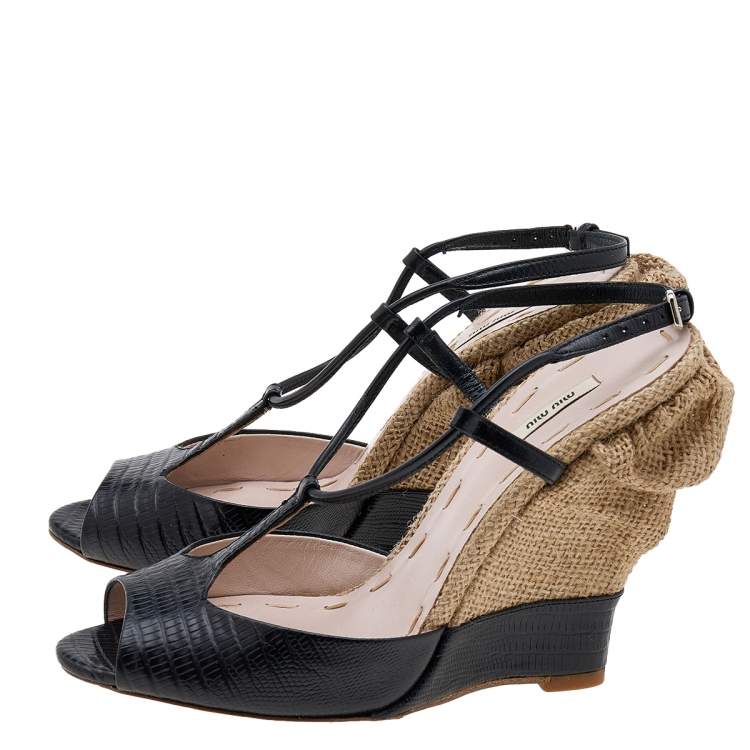 مملوكة مسبقًا Miu Miu Black Lizard Embossed Leather Wedge T Strap Sandals Size 36