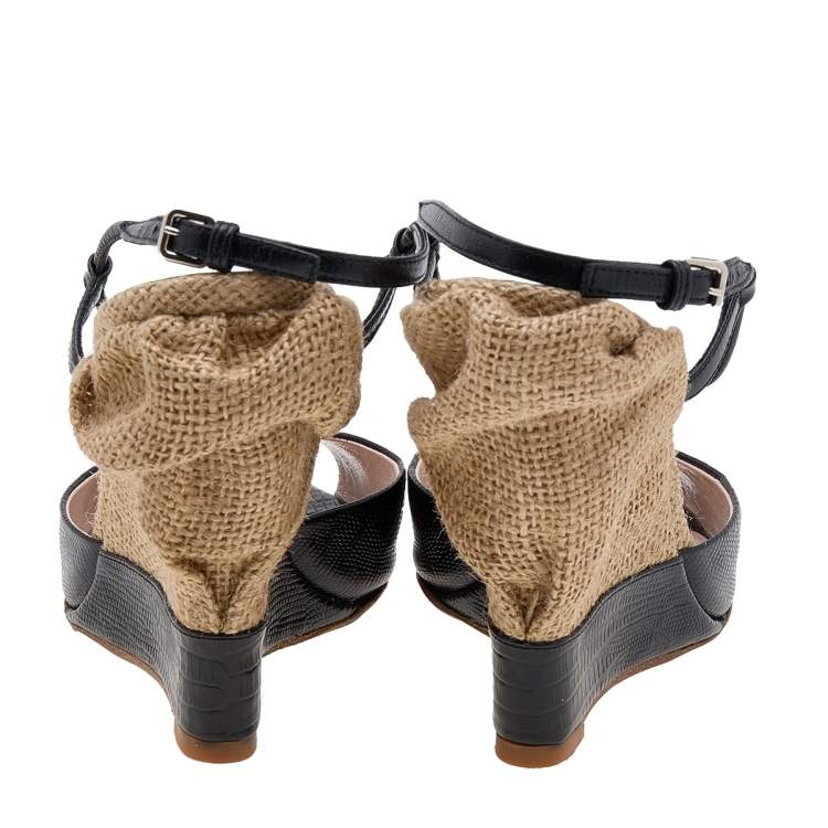 مملوكة مسبقًا Miu Miu Black Lizard Embossed Leather Wedge T Strap Sandals Size 36