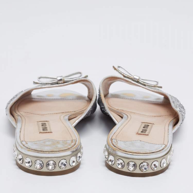 مملوكة مسبقًا Miu Miu Silver Coarse Glitter Embellished Slide Sandals Size 41