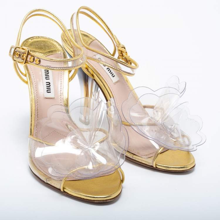 Pre Owned Miu Miu Gold Leather and PVC Flower Applique Ankle-Strap Sandals Size 36.5
