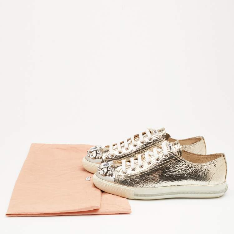 Pre Owned Miu Miu Metallic Gold Leather Crystal Embellished Metal Cap Toe Low Top Sneakers Size 37