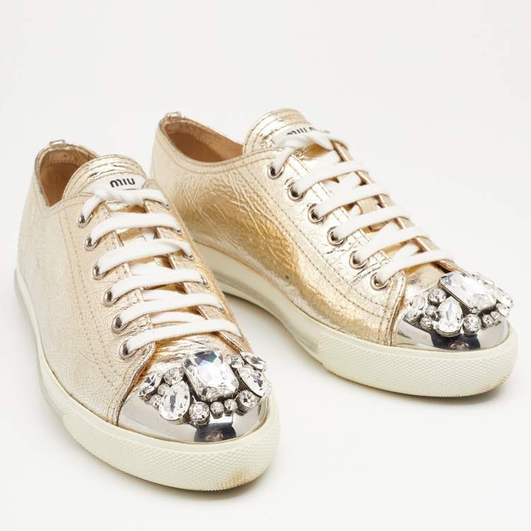 Pre Owned Miu Miu Metallic Gold Leather Crystal Embellished Metal Cap Toe Low Top Sneakers Size 37