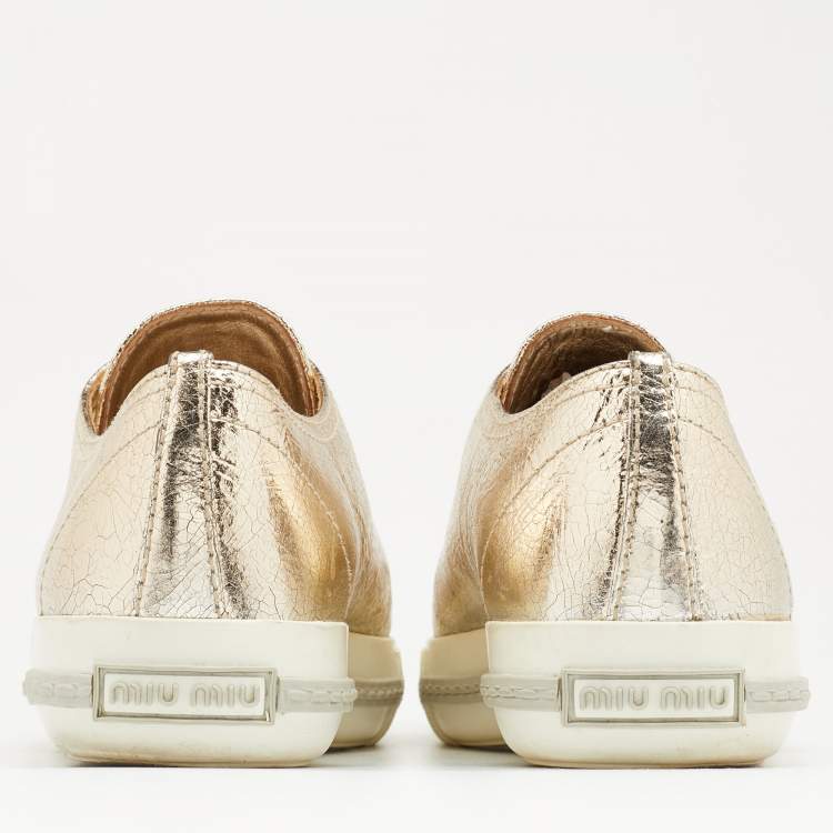 Pre Owned Miu Miu Metallic Gold Leather Crystal Embellished Metal Cap Toe Low Top Sneakers Size 37