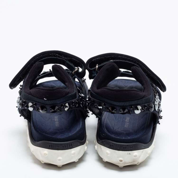 مملوكة مسبقًا Miu Miu Navy Blue Satin And Fabric Crystal Embellished Ankle Strap Sandals Size 37.5