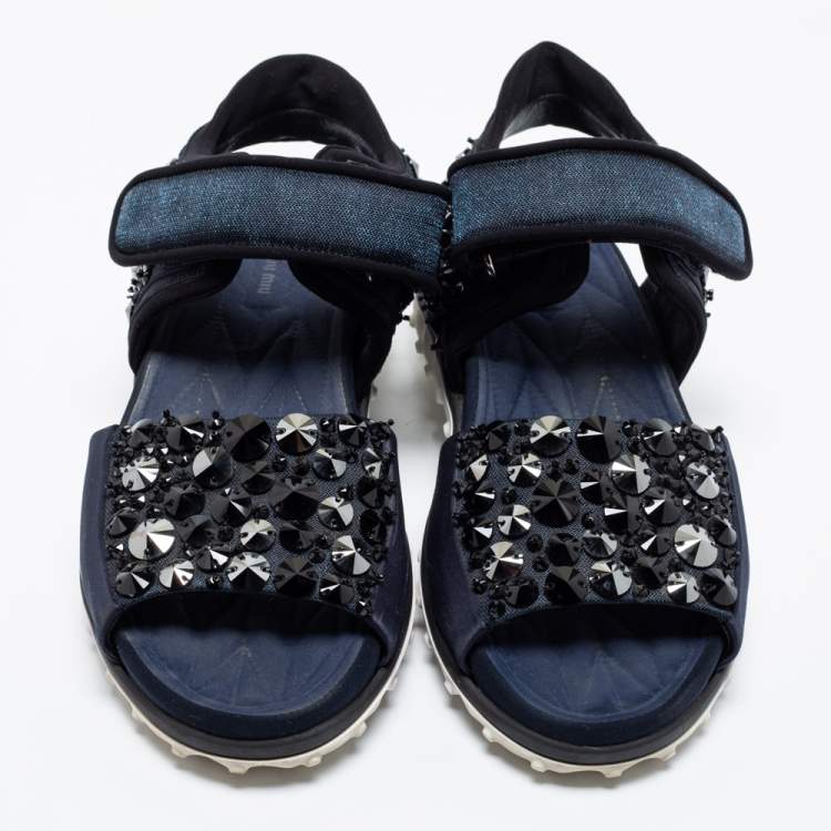 مملوكة مسبقًا Miu Miu Navy Blue Satin And Fabric Crystal Embellished Ankle Strap Sandals Size 37.5
