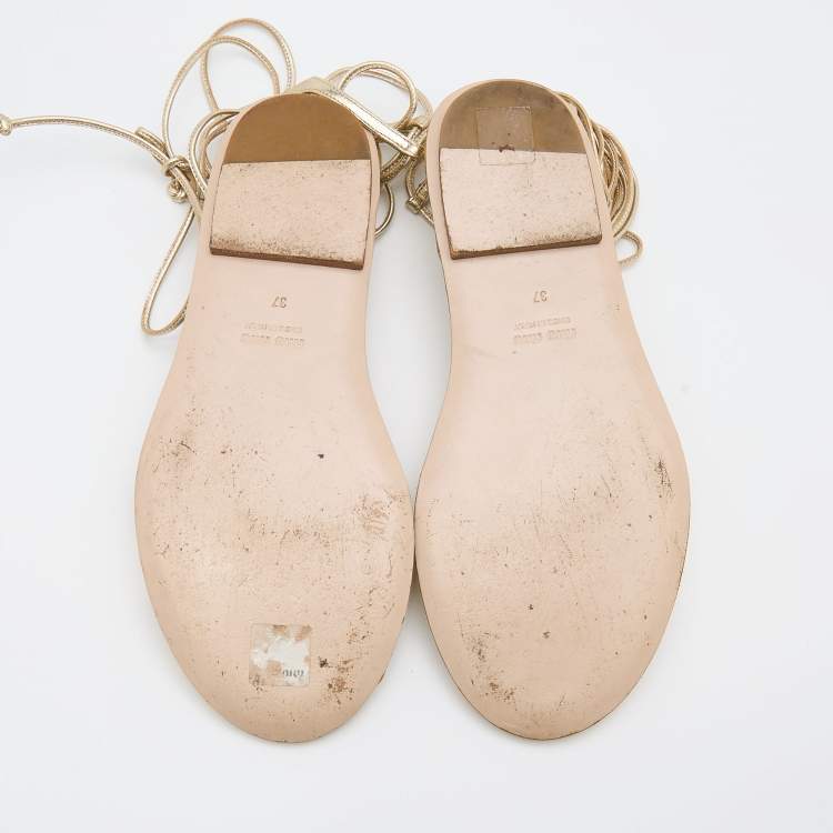 Pre Owned Miu Miu Gold Leather Flat Ankle Wrap Sandals Size 37