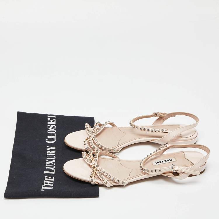 مملوكة مسبقًا Miu Miu Pink Patent Leather Strappy Crystal Embellished Flat Sandals Size 38