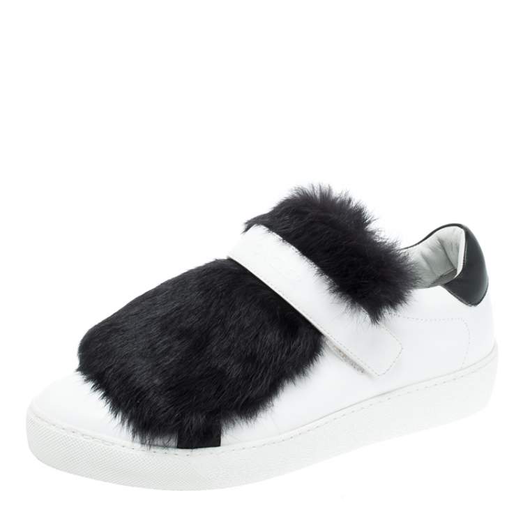 white sneakers with fur