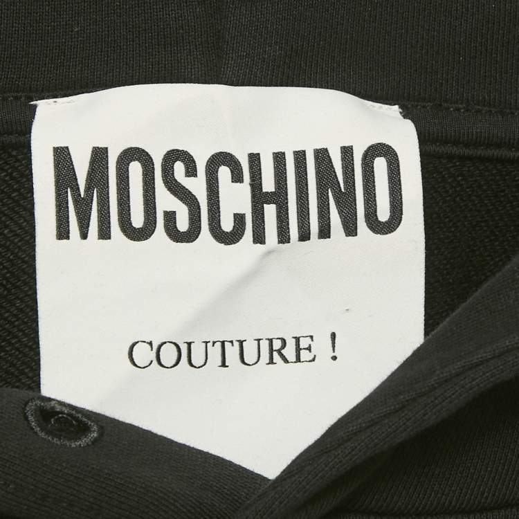 مملوكة مسبقًا هودي قطن واسع بطبعة شعار موسكينو كوتور أسود صغير