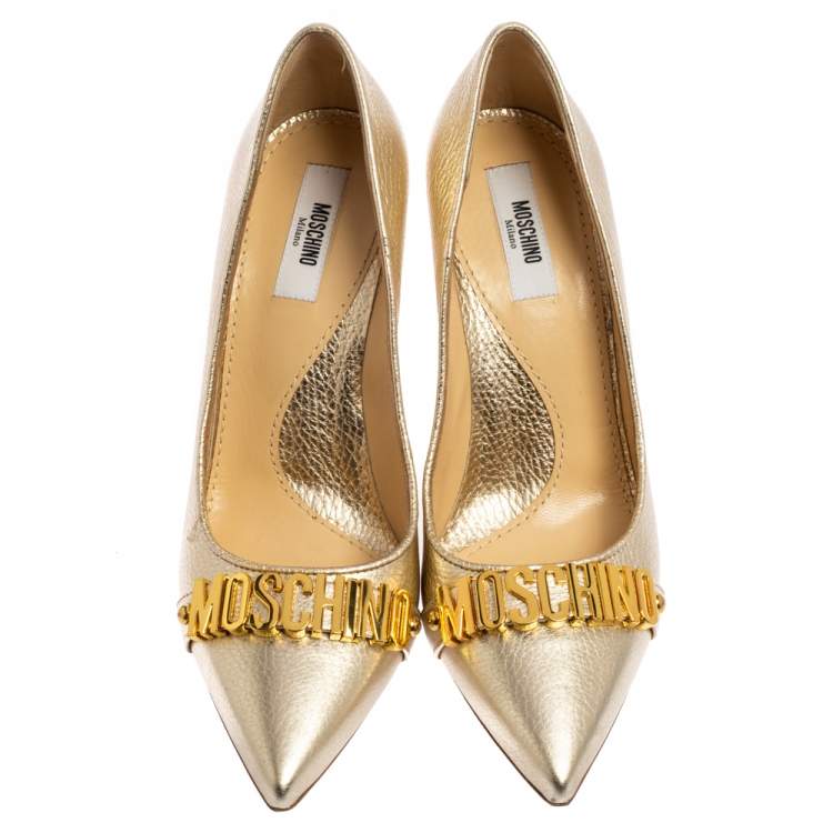 Pre Owned Moschino Metallic Gold Leather Logo Pointed Toe Pumps Size 37