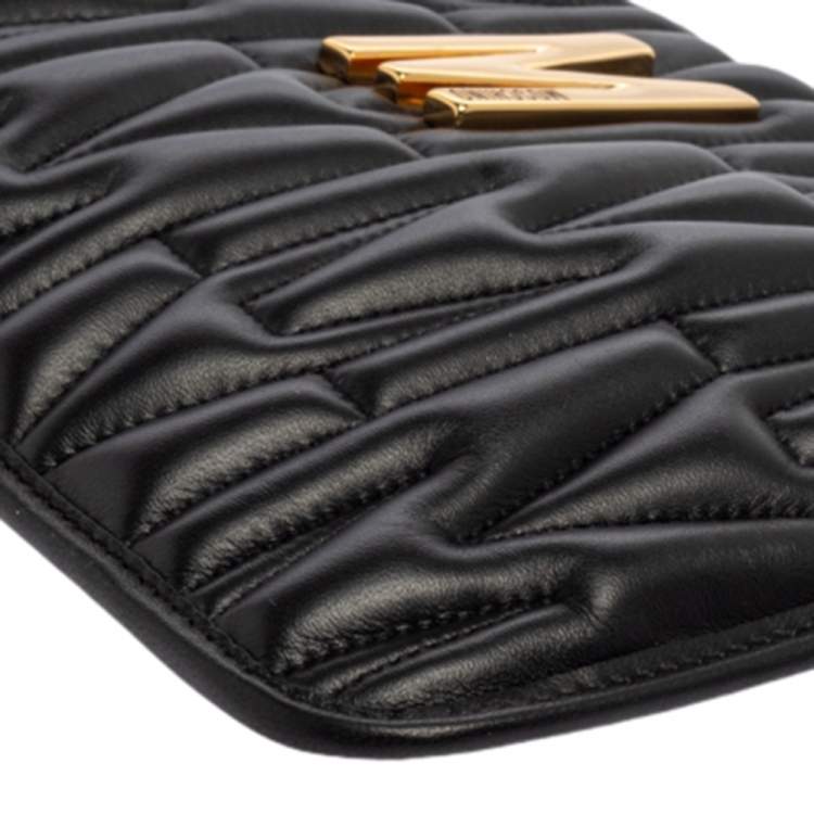 Pre Owned Moschino Black Monogram Embossed Leather M Pouch