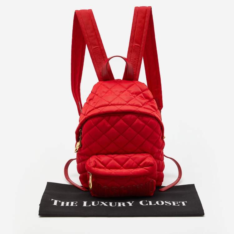Pre Owned Moschino Red Quilted Nylon Logo Backpack