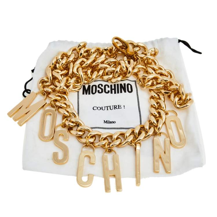 Pre Owned Moschino Gold Tone Metal Lettering Charms Chain Belt