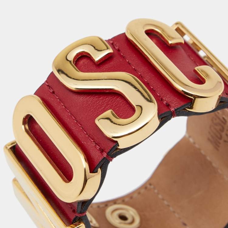 Pre Owned Moschino Logo Plaque Red Leather Gold Tone Metal Cuff Bracelet