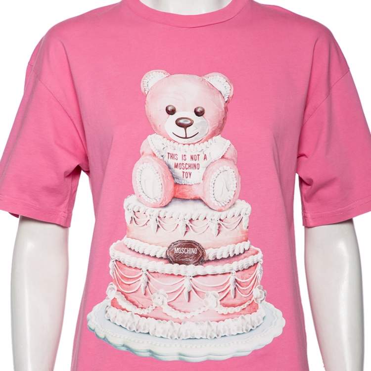 Pre Owned Moschino Pink Cotton Cake Teddy Bear Logo Printed Short Sleeve T-Shirt XS