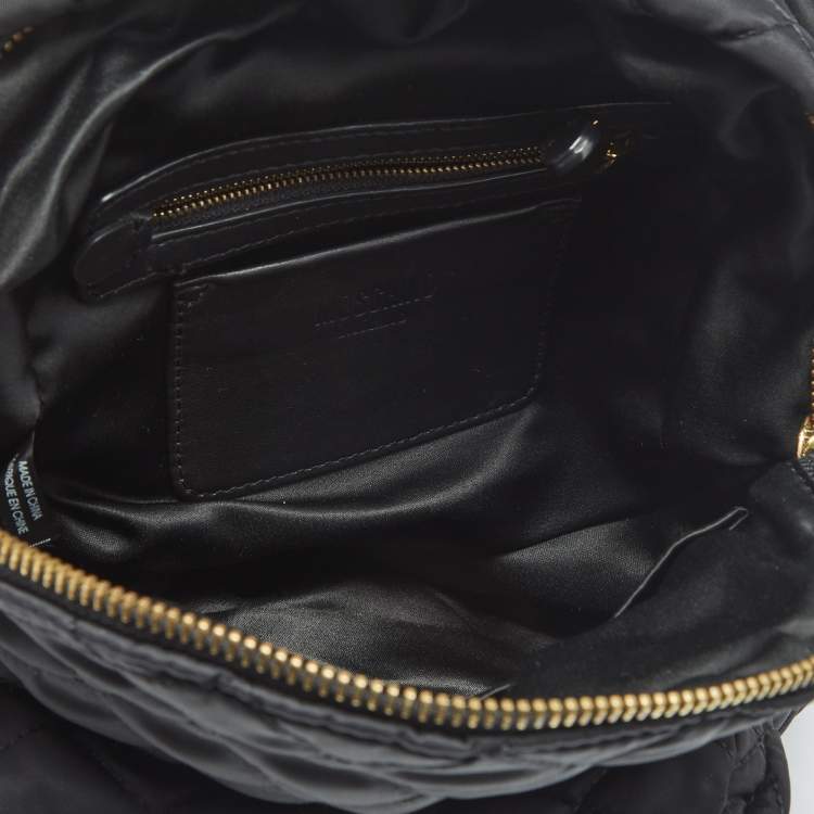 Pre Owned Moschino Black Quilted Nylon and Leather Studded Classic Logo Backpack