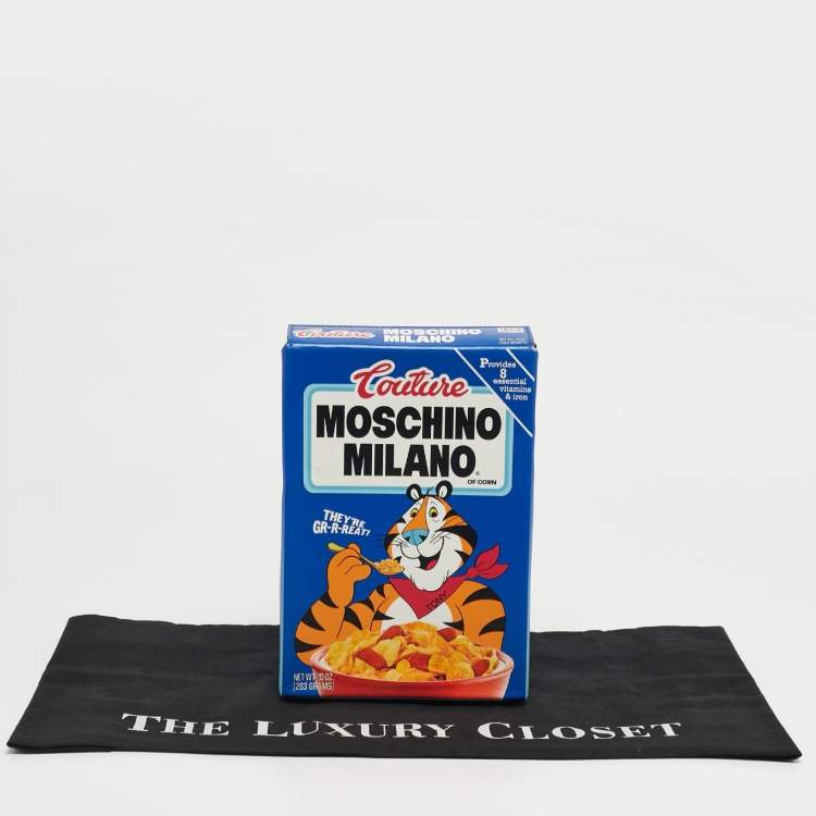 مملوكة مسبقًا حقيبة كلاتش موسكينو توني ذا تايجر إديشن صندوق حبوب جلد أزرق