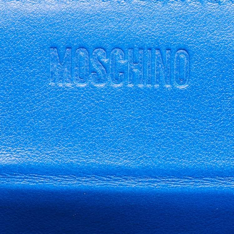 مملوكة مسبقًا حقيبة كلاتش موسكينو توني ذا تايجر إديشن صندوق حبوب جلد أزرق