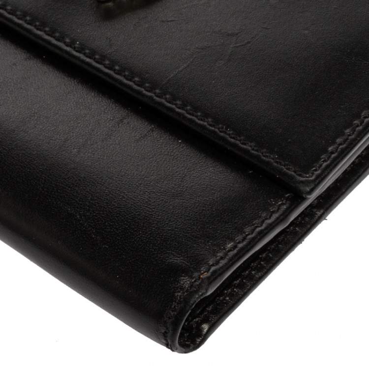 Pre Owned Moschino Black Leather Horseshoe Buckle Crystal Embellished Flap Compact Wallet