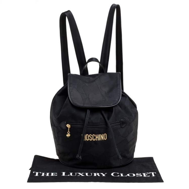 Pre Owned Moschino Black Nylon Logo Flap Backpack