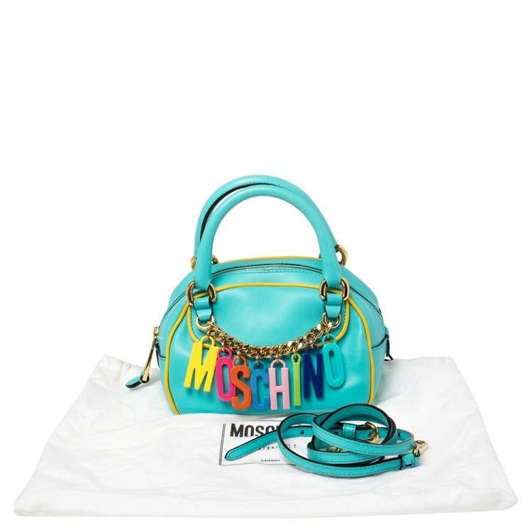Pre Owned Moschino Turquoise/Yellow  Leather Logo Charm Satchel