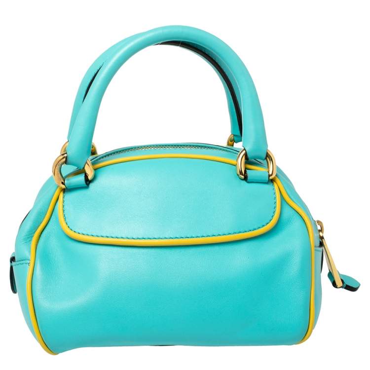 Pre Owned Moschino Turquoise/Yellow  Leather Logo Charm Satchel