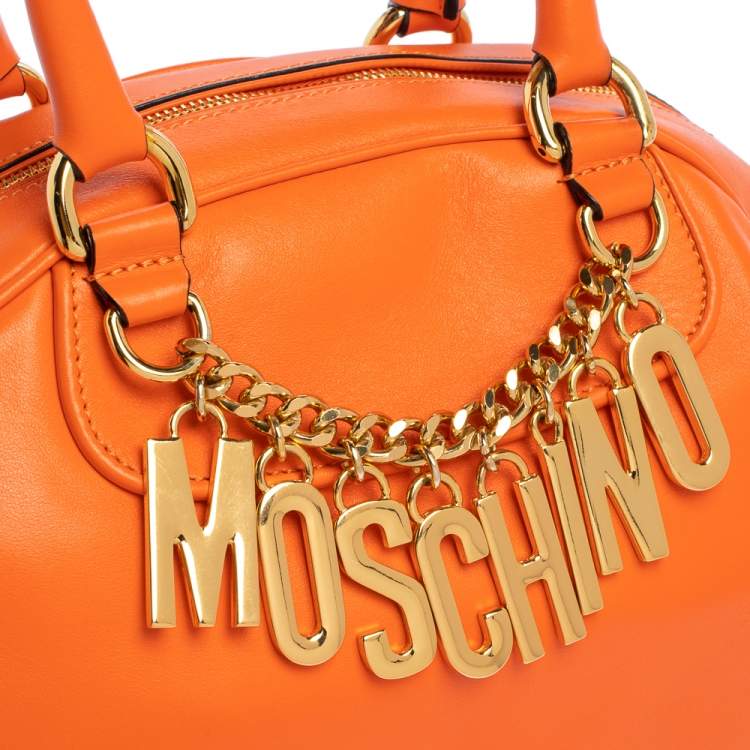 Pre Owned Moschino Orange Leather Logo Charm Bowling Bag