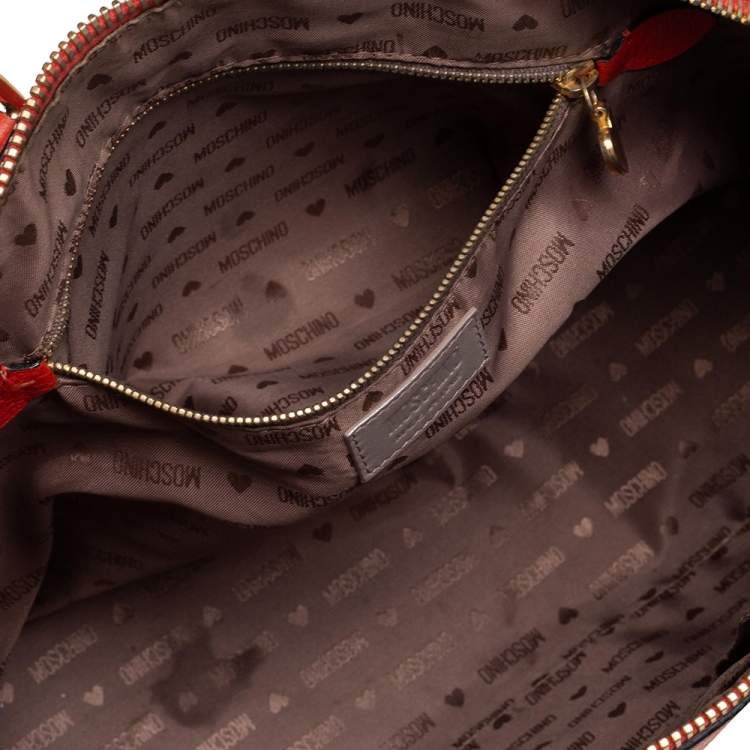 Pre Owned Moschino Orange Logo Plaque Leather Dome Satchel
