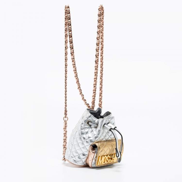 Pre Owned Moschino Metallic Silver Quilted Leather Logo Drawstring BackPack