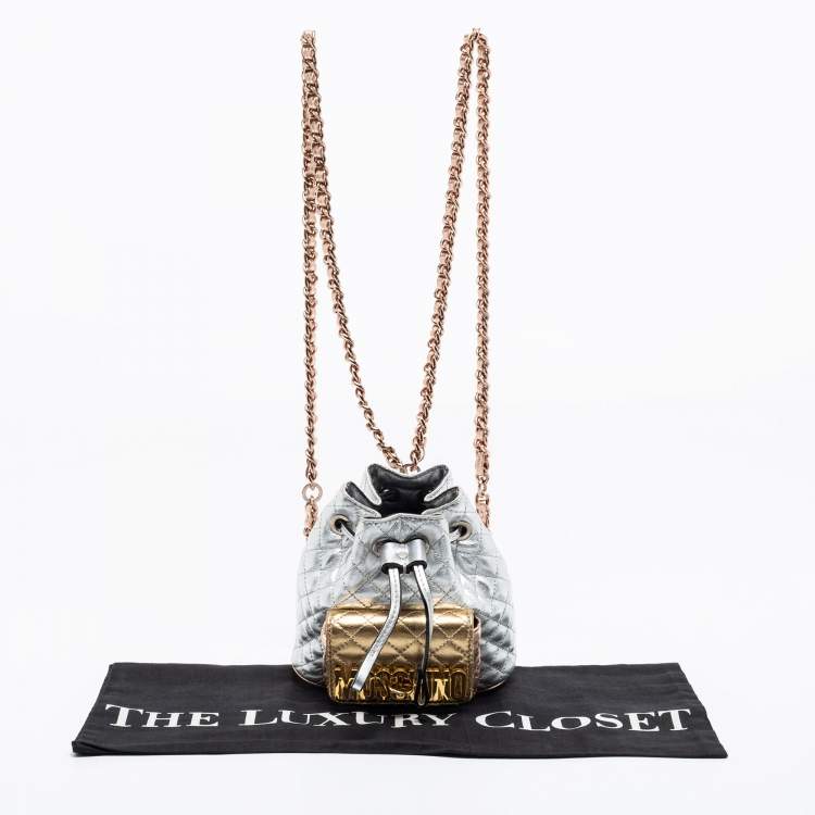 Pre Owned Moschino Metallic Silver Quilted Leather Logo Drawstring BackPack