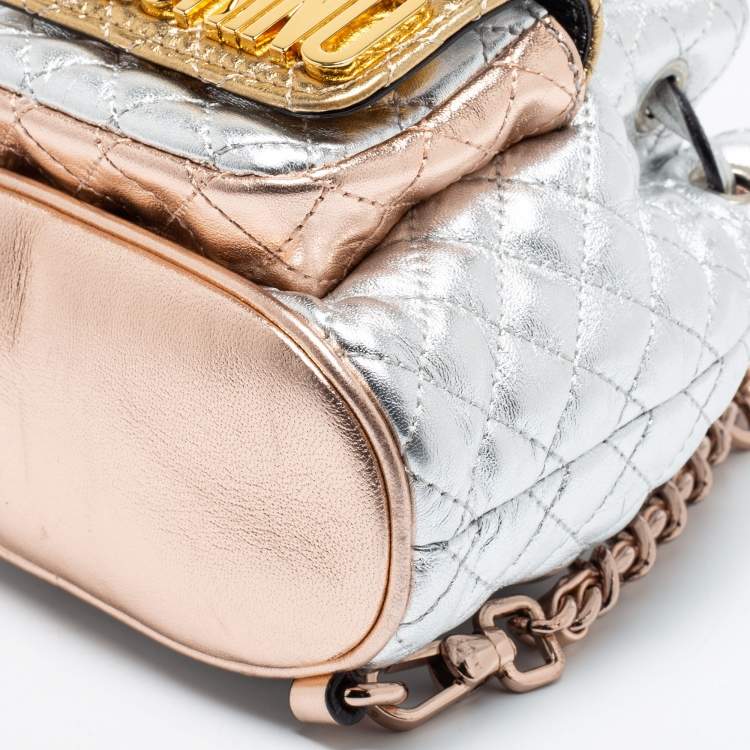 Pre Owned Moschino Metallic Silver Quilted Leather Logo Drawstring BackPack