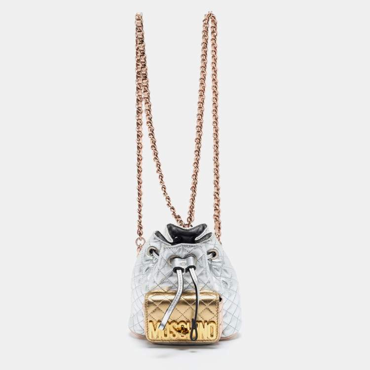 Pre Owned Moschino Metallic Silver Quilted Leather Logo Drawstring BackPack