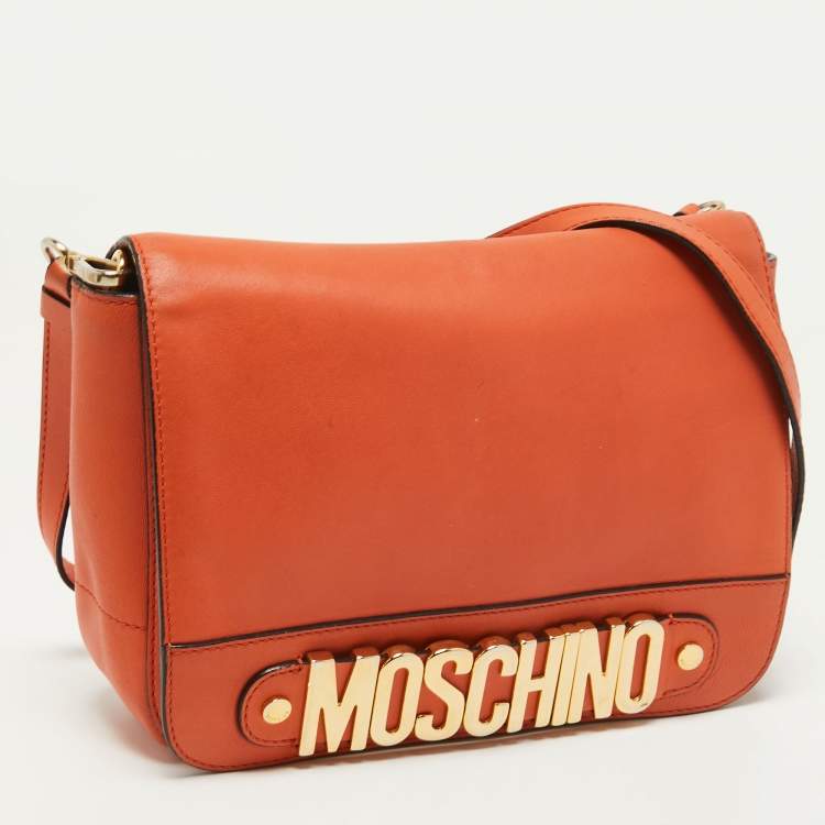 Pre Owned Moschino Orange Leather Limited Edition Logo Flap Crossbody Bag