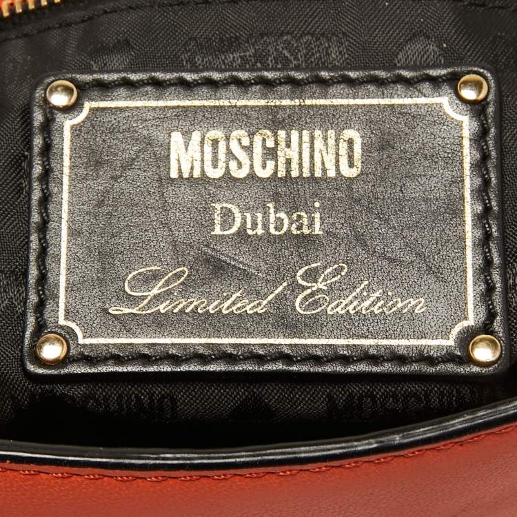 Pre Owned Moschino Orange Leather Limited Edition Logo Flap Crossbody Bag