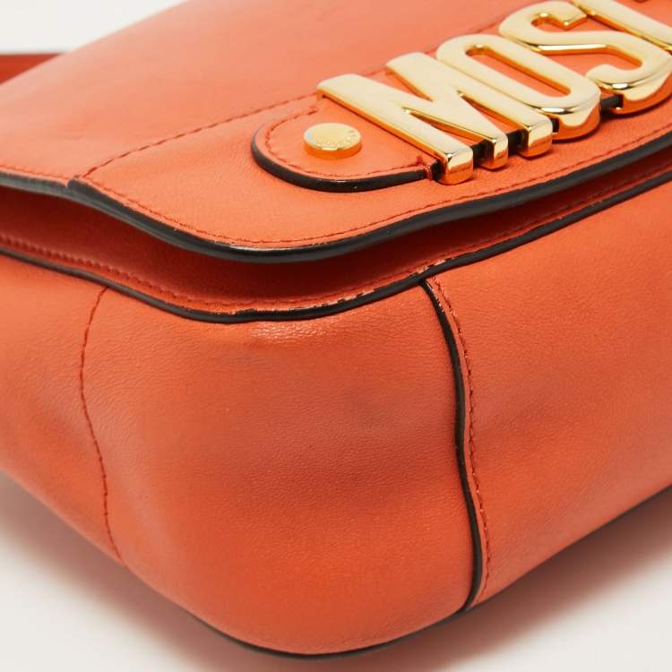 Pre Owned Moschino Orange Leather Limited Edition Logo Flap Crossbody Bag