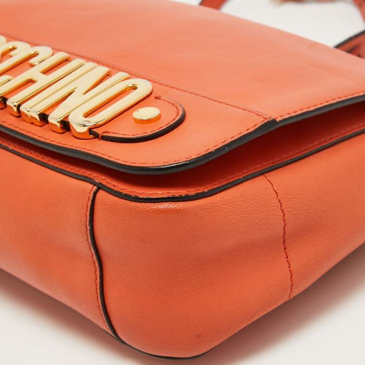 Pre Owned Moschino Orange Leather Limited Edition Logo Flap Crossbody Bag
