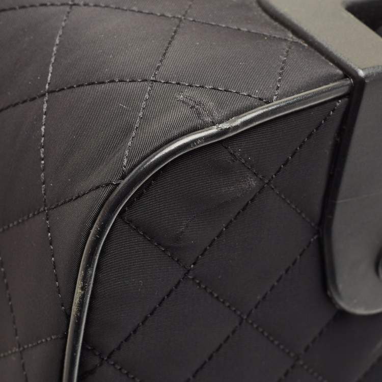مملوكة مسبقًا Moschino Black Quilted Nylon and Leather Classic Logo Carry On Rolling Luggage 