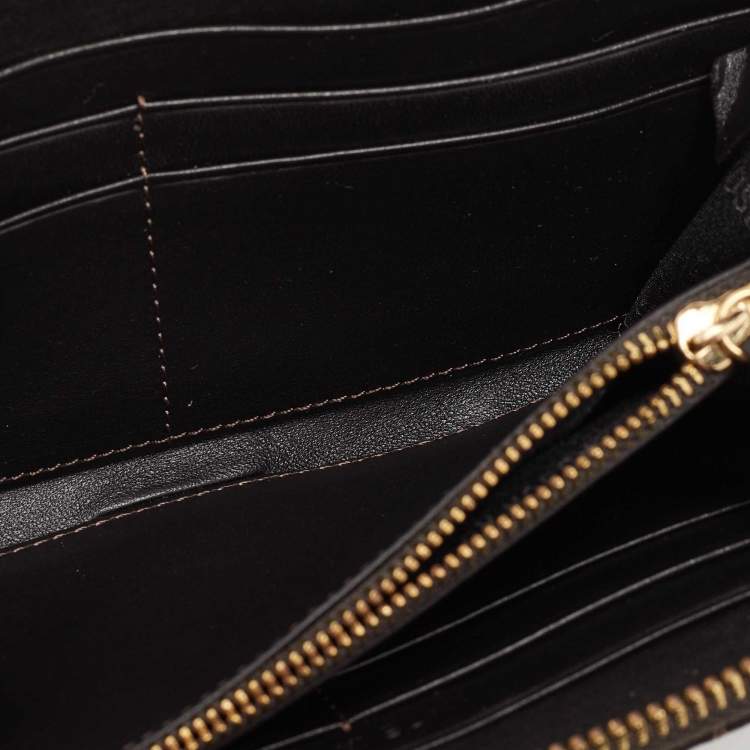 Pre Owned Moschino Brown Signature Canvas Zip Around Wallet