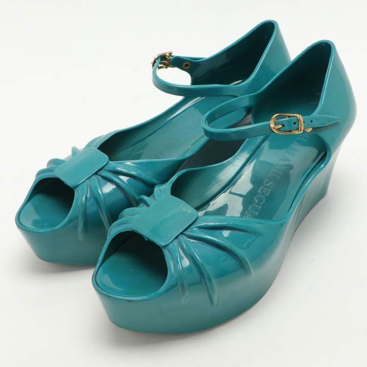 【Moschino】40mmウェビングのフスベットサンダル Moschino x Kartell Blue Rubber Jelly Super Bow Wedge Sandals