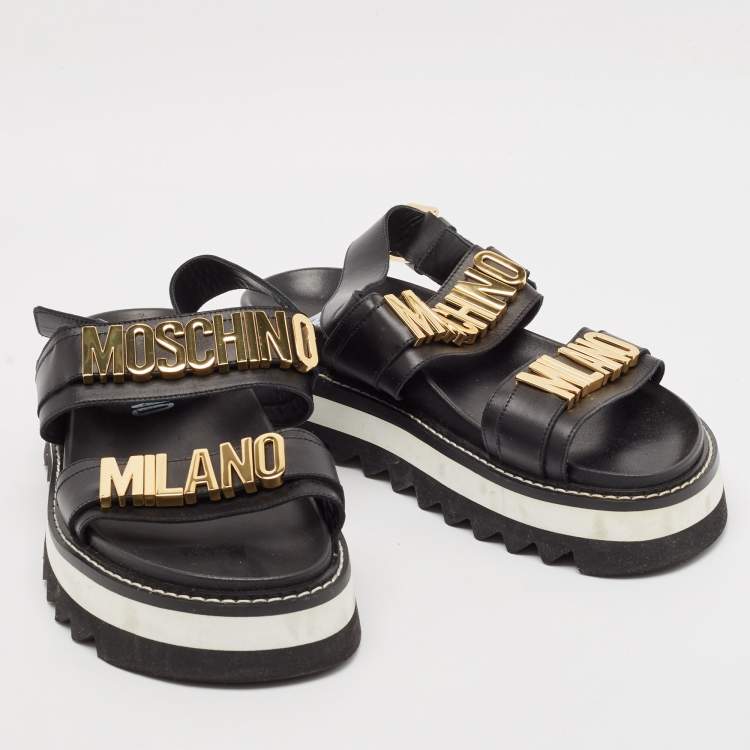 Pre Owned Moschino Black Leather Logo plaque Slingback Sandals Size 43