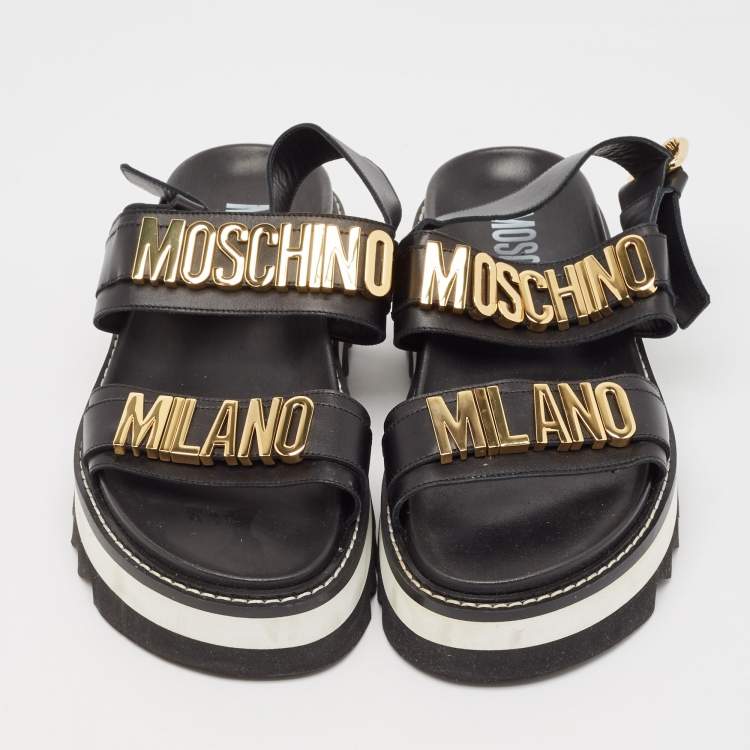Pre Owned Moschino Black Leather Logo plaque Slingback Sandals Size 43